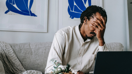 Man frustrated with top web design mistakes